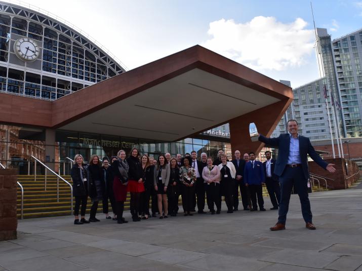 Staff outside the venue celebrating award win